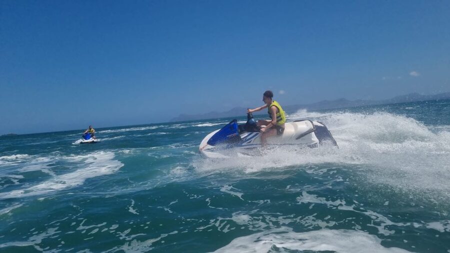 Alcudia: 30-Minute Jet Ski Adventure for Beginners & Photos - Riding past Alcudia Beach