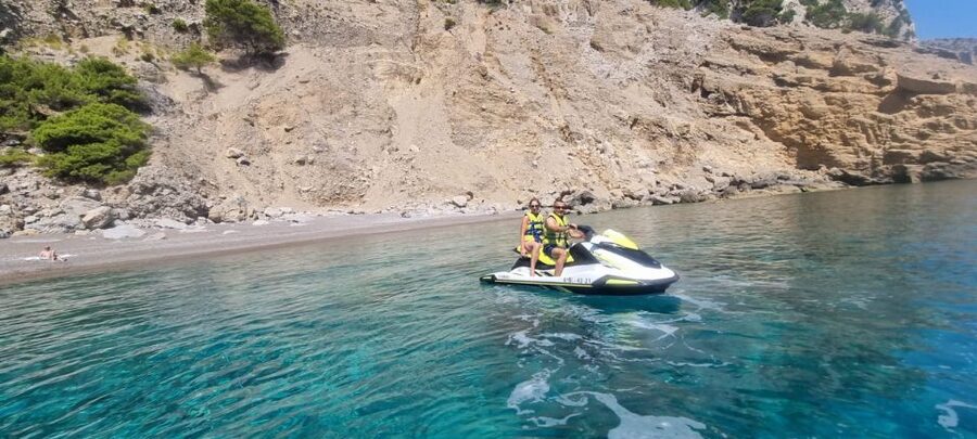 Alcudia: Aucanada Beach Jet Ski Trip - Crossing Alcudia Bay toward Aucanada