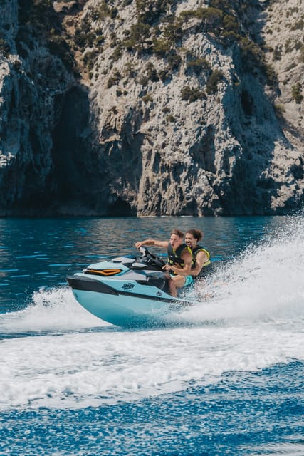 Alcudia: JetSki Tour Coll Baix beach & Caves (free Photos) - Riding a new jet ski along Mallorca’s north coast