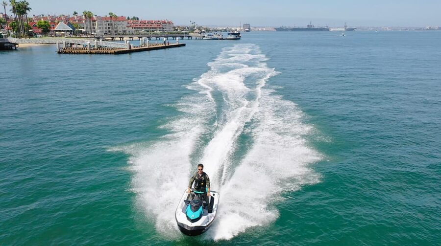 Coronado: San Diego Bay Jetski Rental - Riding past the bridge and city skyline