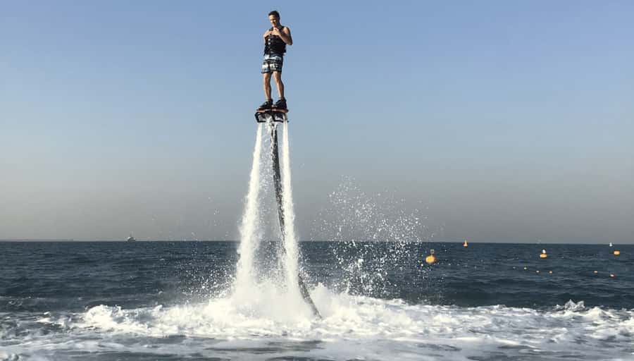 Dubai: Jet ski & Flyboard in Dubai Free Ice Cream - Riding the Jumeirah coast toward Burj Al Arab