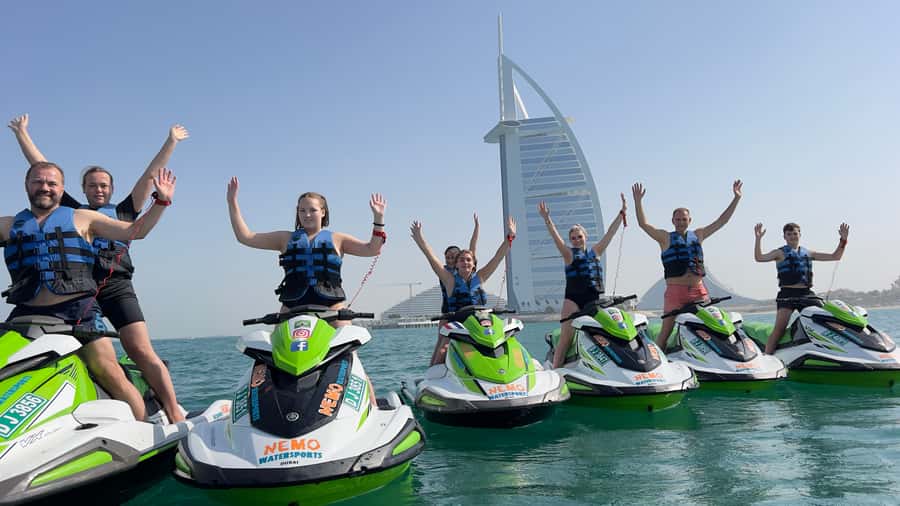 Dubai: Jet Ski to Atlantis with Videos, Photos and Ice Cream - A beach pause and the distant Burj Khalifa