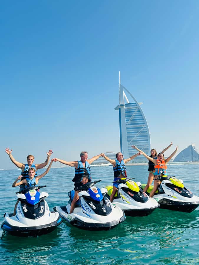 Dubai: Jet Ski Tour of Burj Al Arab with Photos - Returning with views toward the Burj Khalifa