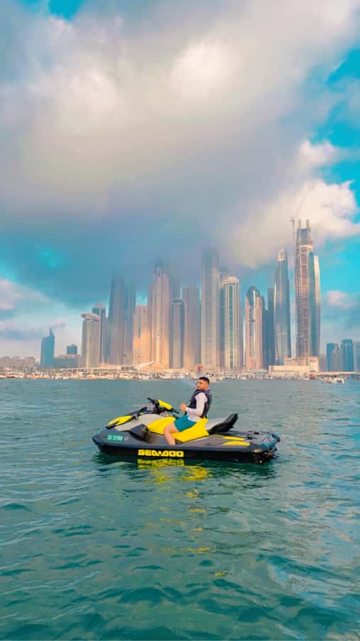 Dubai: Sunrise Jetski Tour with Guide and Photos - Sunrise on Dubai Marina water