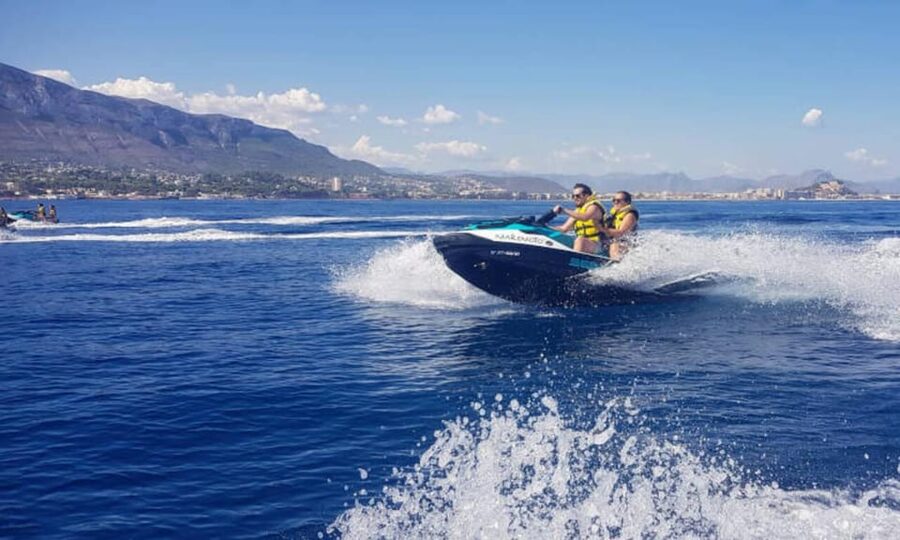 From Dénia/Jávea: Cala Blanca Boat Trip with Jet Ski & Lunch - Swimming and snorkeling in clear water