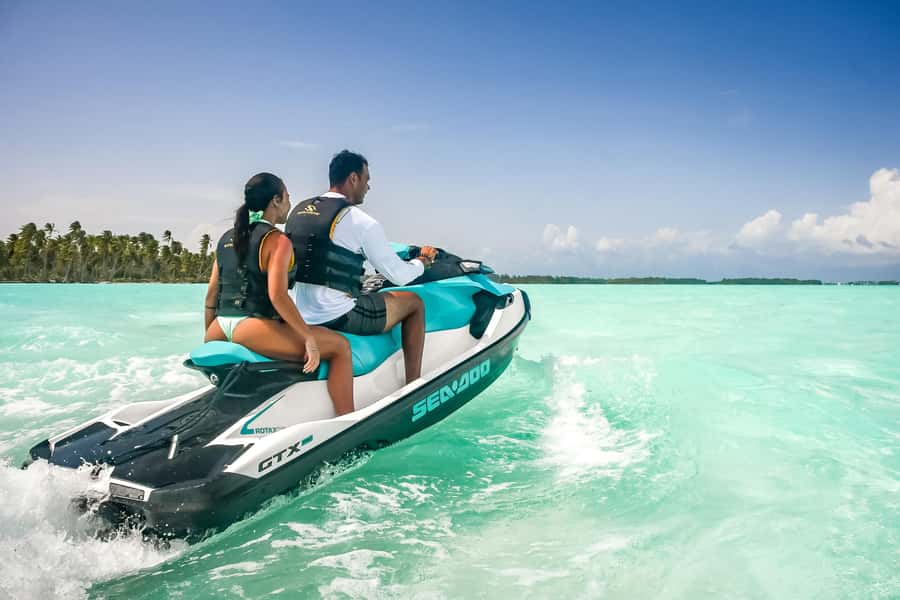 Jet Ski Around Bora Bora - Speed Through Paradise - Swimming in the clear lagoon