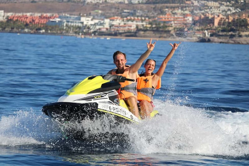 Puerto Colón: Tenerife Coast Jet Ski Tour with Photos - The speedboat transfer gets you out of the marina