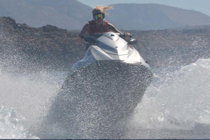 Santorini: Perivolos Beach Jet Ski Rental - Getting Ready With a Life Jacket and Yamaha Sport Jet Ski