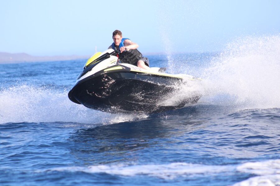 Tenerife: Jet Ski Guided Tour with Optional Photo Service - The swimming stop and the wet reality