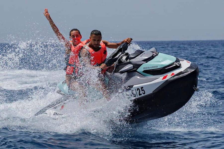 Tenerife: Jet Ski Ocean Safari with Optional Transfer - The coastline from a lower, faster viewpoint