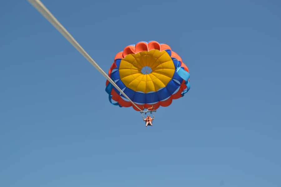 Triple Package Self Drive Jet Ski, Banana & Parasailing - Parasailing above Nusa Dua’s coast